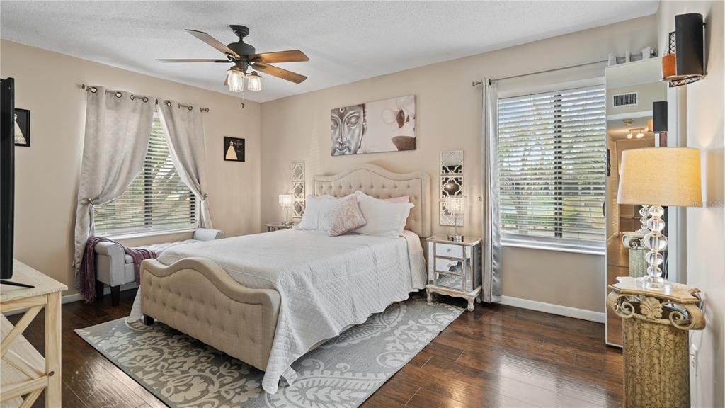 8203 Sun Spring Circle, Unit 12 Orlando, FL 32825 - Photo 6 of 38 a bed room with a bed and a window