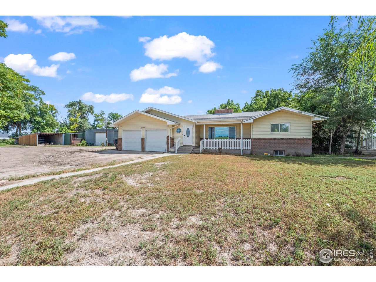 a house view with a garden space