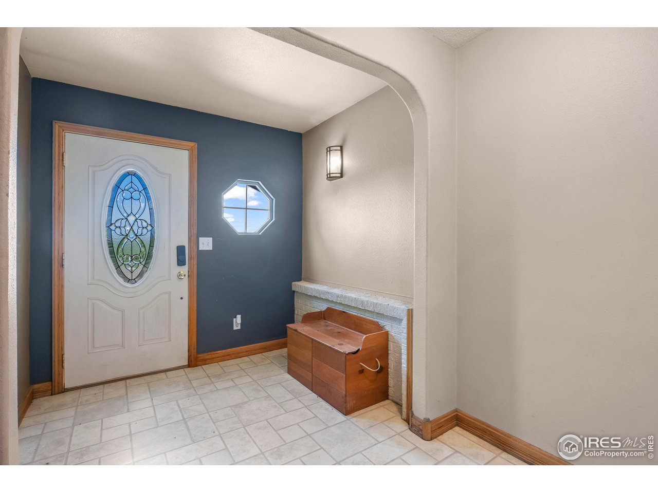 32864 County Road 49 Greeley, CO 80631 - Photo 3 of 40 a room with a mirror and a table