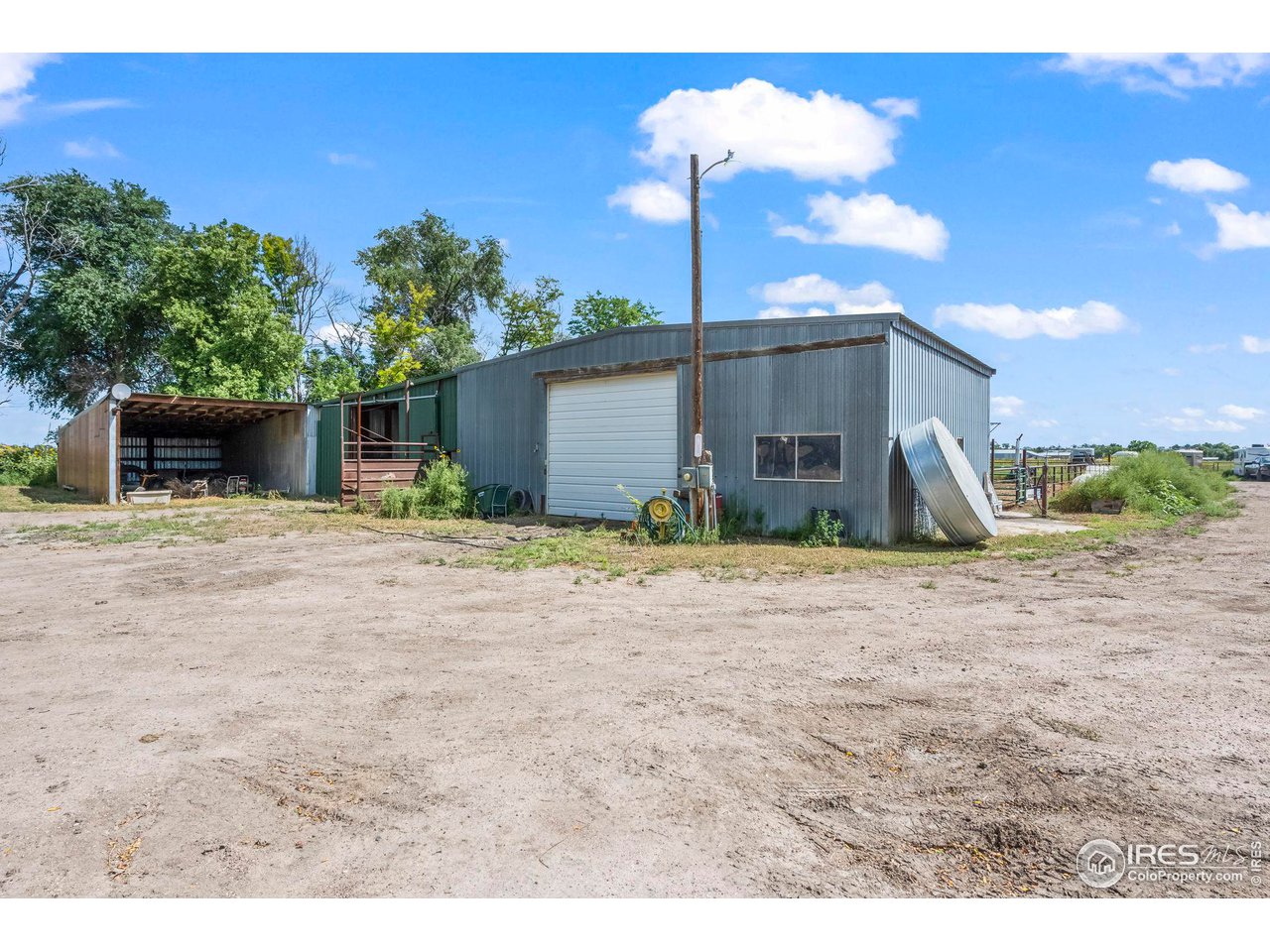 32864 County Road 49 Greeley, CO 80631 - Photo 35 of 40 a view of a house with backyard