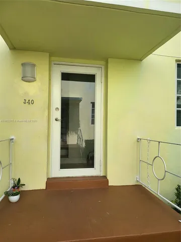 a view of a room with windows