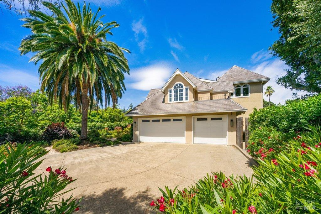 82 McNear Drive San Rafael, CA 94901 - Photo 48 of 54 a front view of a house with a garden