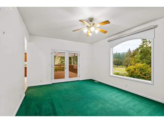 a view of an empty room with window