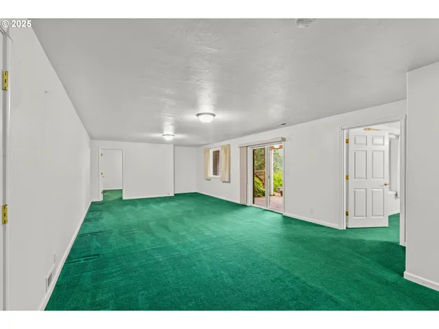 a view of an empty room with window