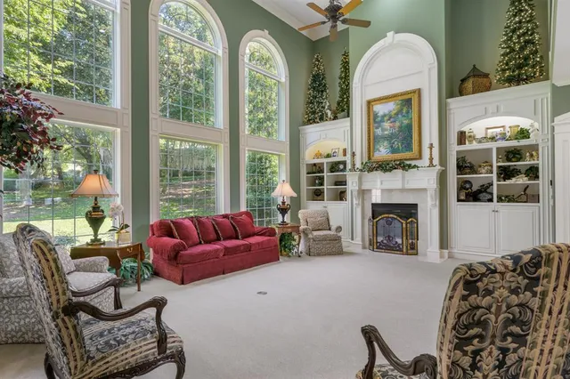 a kitchen with stainless steel appliances granite countertop a stove sink and cabinets