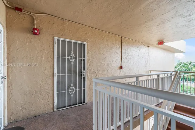 a view of a room with staircase
