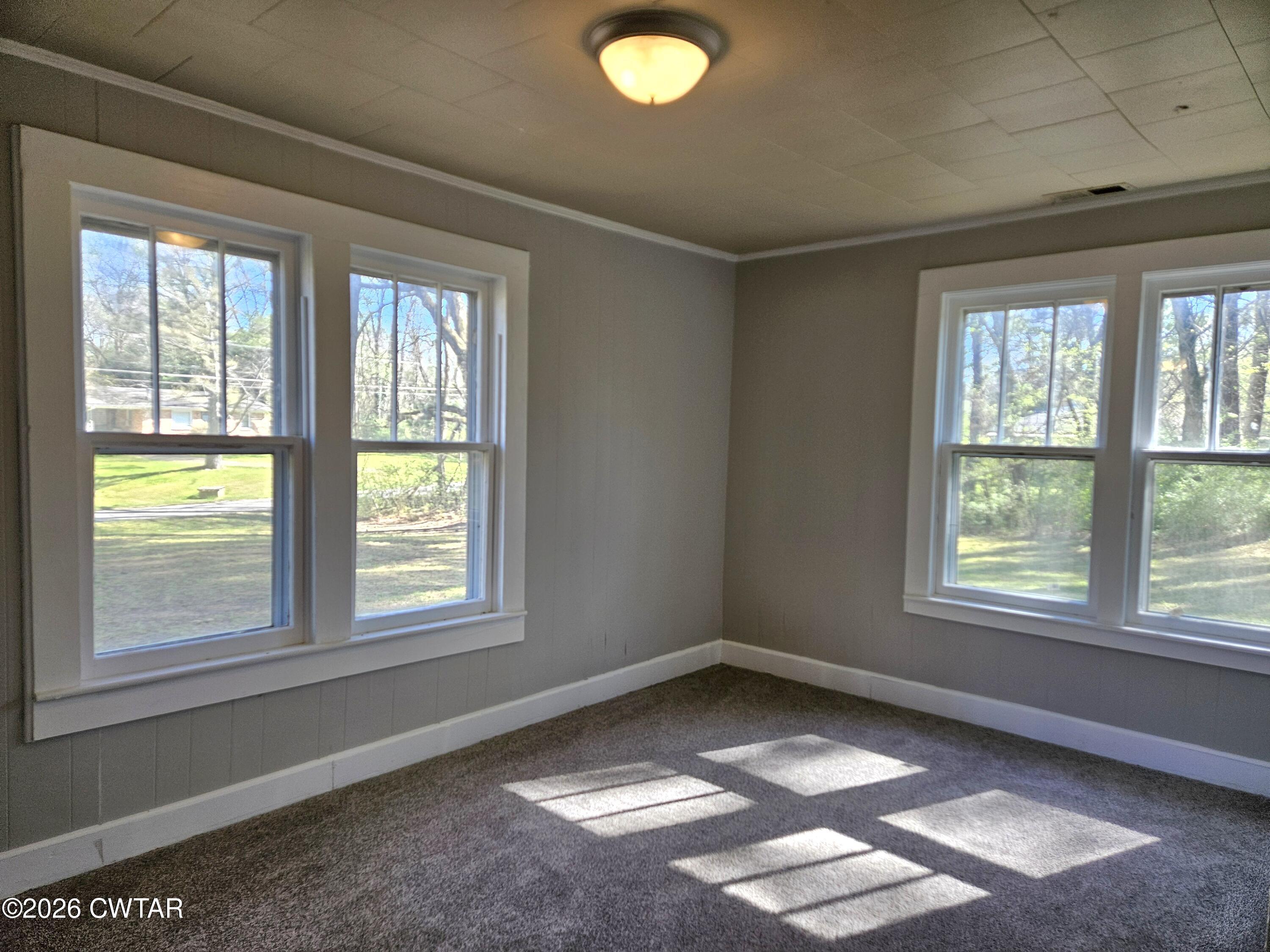 550 Lawrence Switch Road Jackson, TN 38305 - Photo 13 of 25 an empty room with a window
