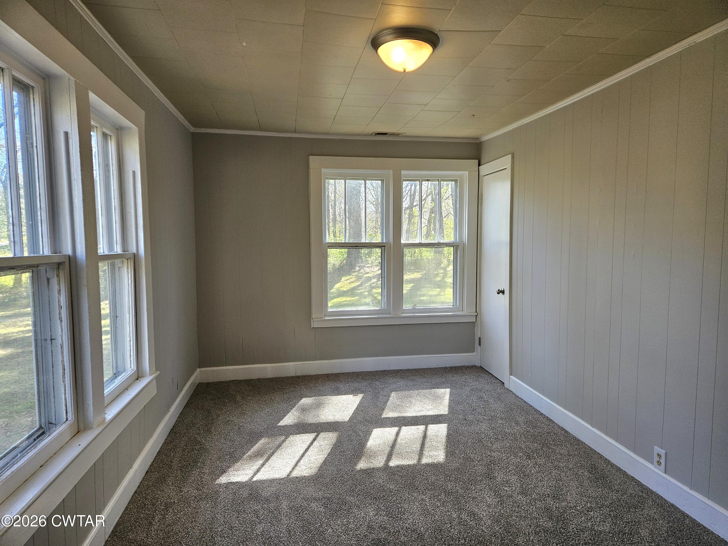 550 Lawrence Switch Road Jackson, TN 38305 - Photo 17 of 25 an empty room with windows