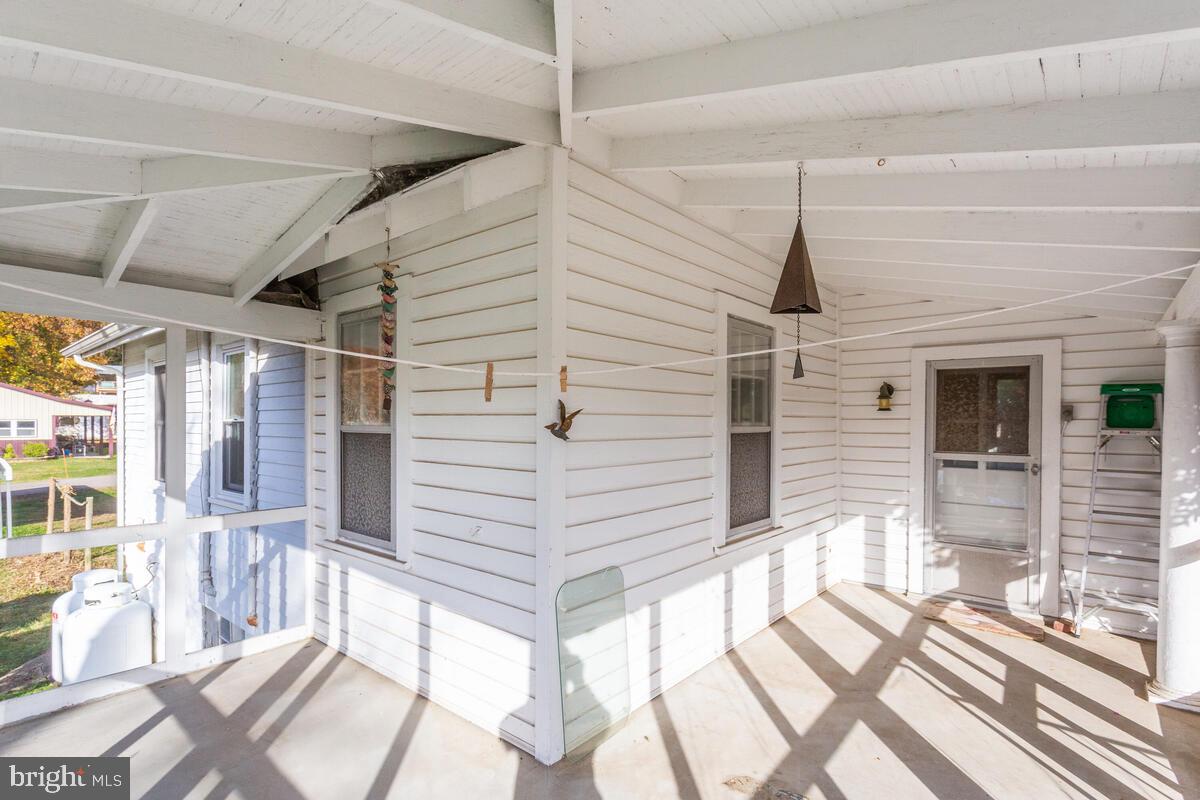 3300 Recker Road Chesapeake Beach, MD 20732 - Photo 8 of 66 Screened porch