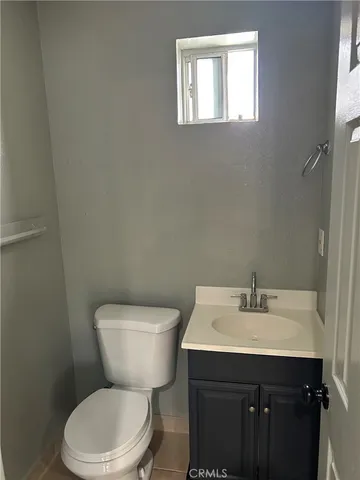 a kitchen with stainless steel appliances granite countertop a sink and dishwasher a refrigerator