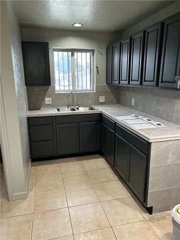 a view of a lobby with furniture and a window