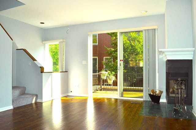 1765 West Altgeld Street, Unit M Chicago, IL 60614 - Photo 2 of 21 a view of an entryway with wooden floor and a window