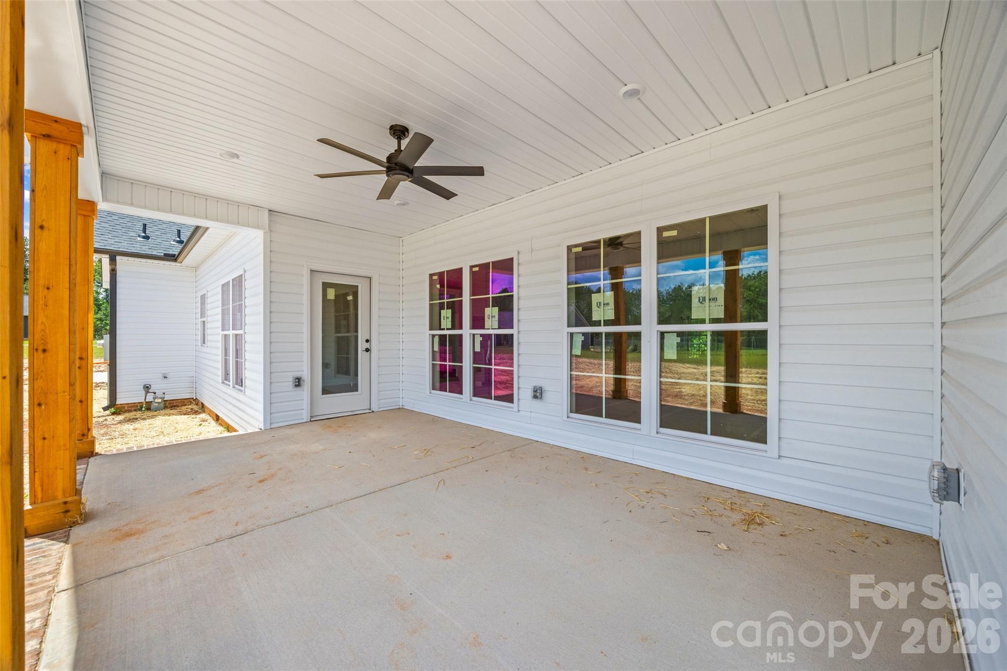 640 Edwards Road Fort Lawn, SC 29714 - Photo 33 of 39 a view of an empty room with a window and a kitchen