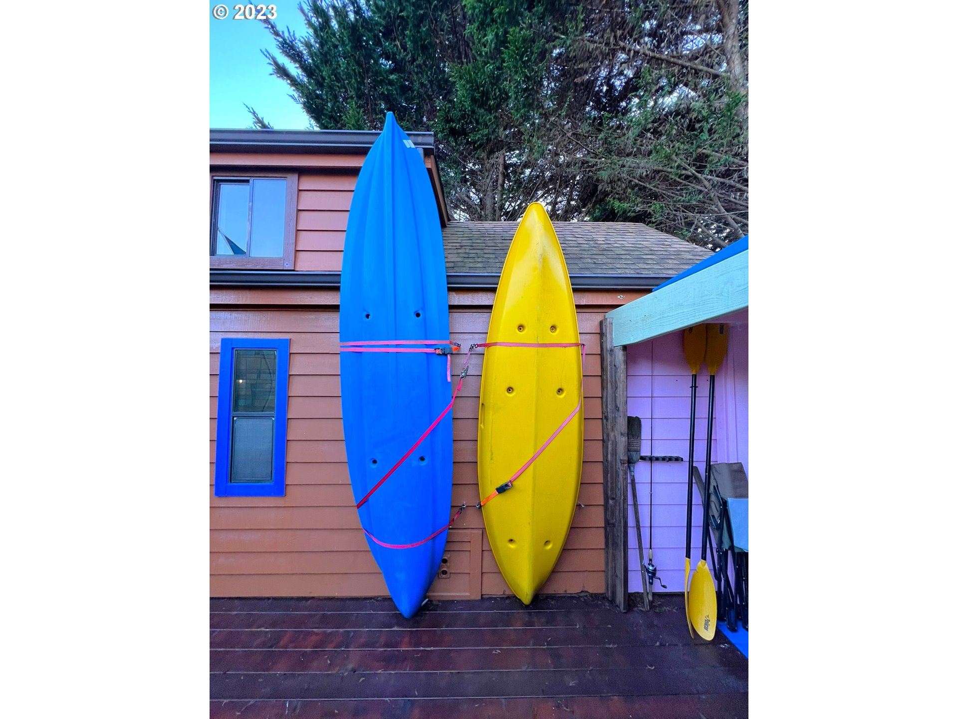 97748 North Bank Chetco River Road, Unit 15 Brookings, OR 97415 - Photo 12 of 48 a view of a backyard with a table and chairs