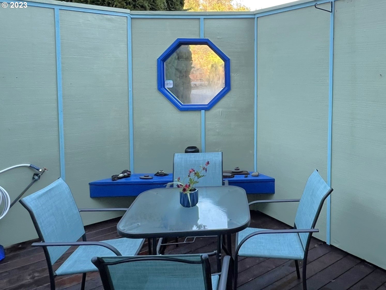 97748 North Bank Chetco River Road, Unit 15 Brookings, OR 97415 - Photo 16 of 48 a view of a workspace with furniture and wooden floor