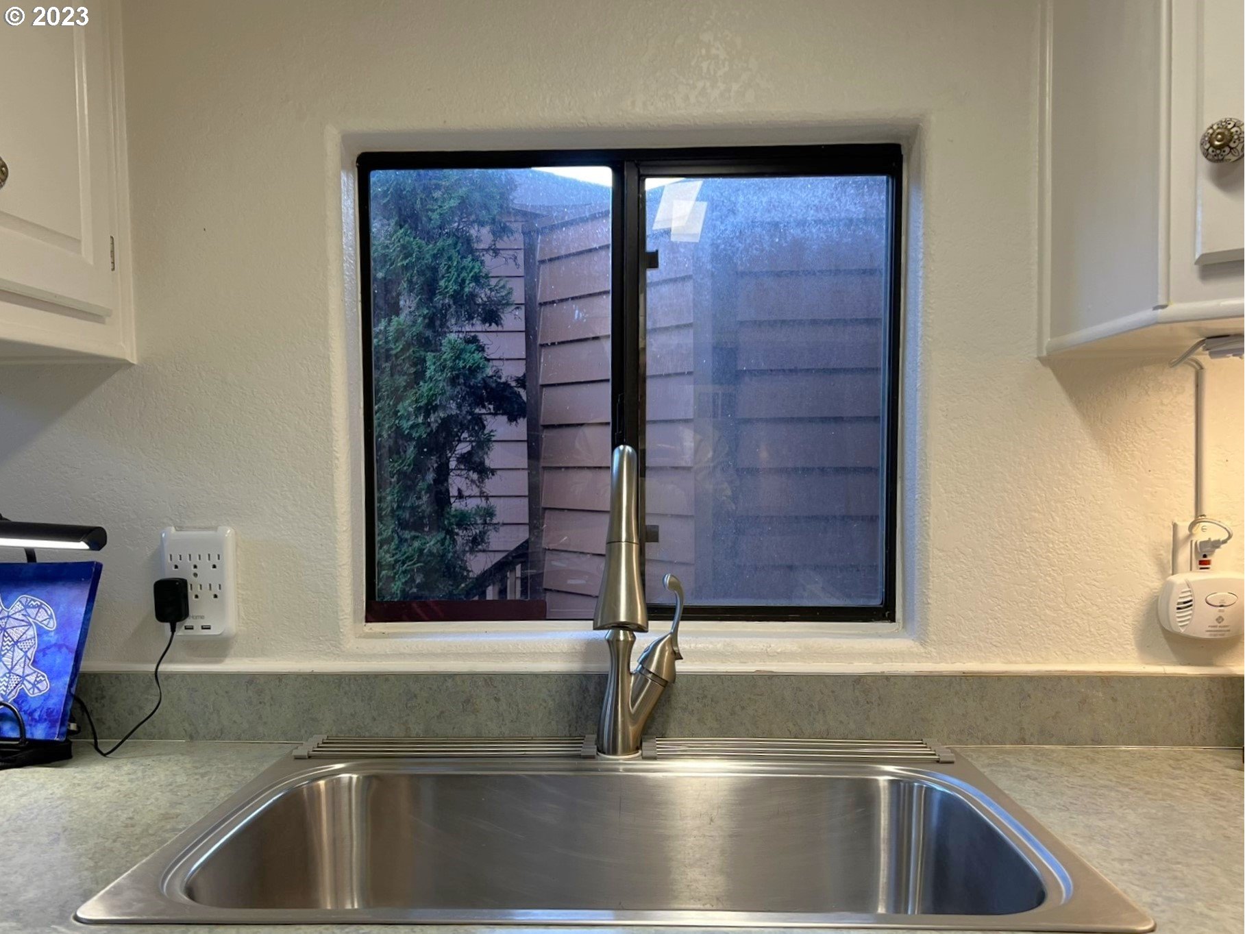 97748 North Bank Chetco River Road, Unit 15 Brookings, OR 97415 - Photo 34 of 48 a close view of sink and tap