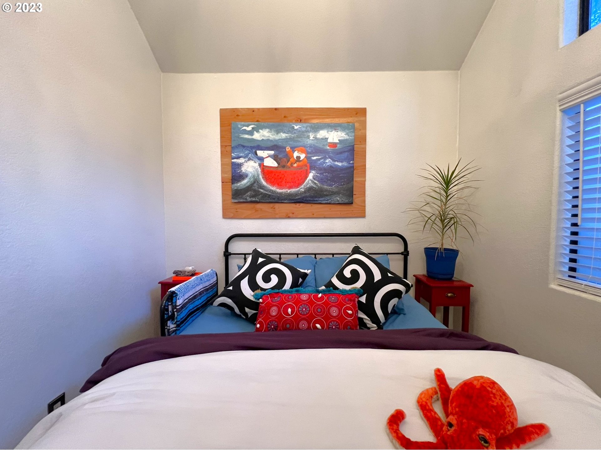 97748 North Bank Chetco River Road, Unit 15 Brookings, OR 97415 - Photo 38 of 48 a utility room with an wall painting on the wall and a potted plant