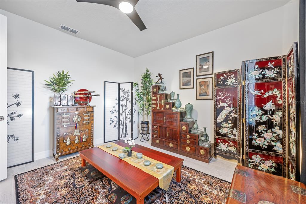 2713 Hilltop Loop Apopka, FL 32712 - Photo 26 of 54 a very nice looking room with a large window and a couch