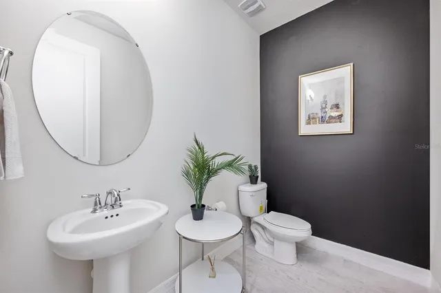 a very nice looking room with a large window and a couch