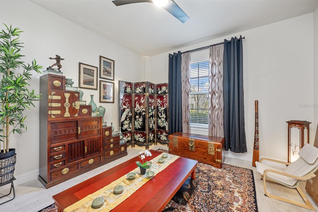 2713 Hilltop Loop Apopka, FL 32712 - Photo 34 of 54 a bedroom with bed and a window