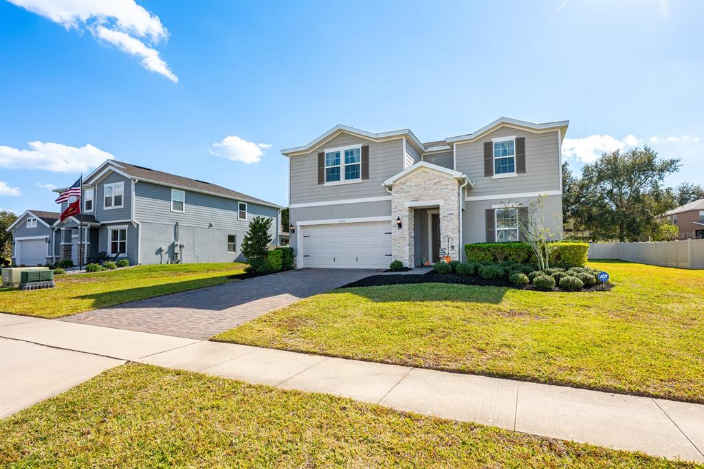 2713 Hilltop Loop Apopka, FL 32712 - Photo 46 of 54 a view of a house with swimming pool and a yard