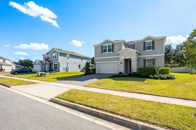 a house view with a swimming pool
