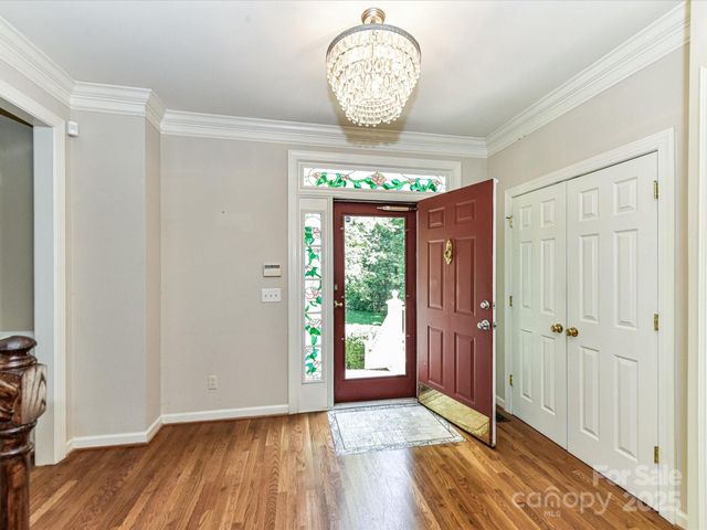 a view of entryway with wooden floor