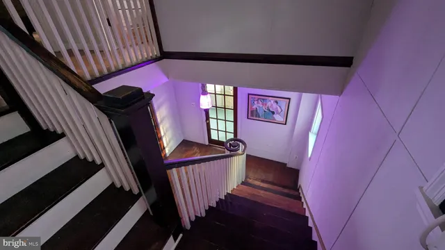 a view of a porch with wooden floor