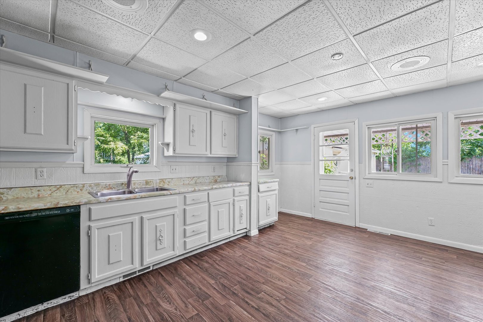 33 State Street Danville, IL 61832 - Photo 13 of 29 a kitchen with sink cabinets and window