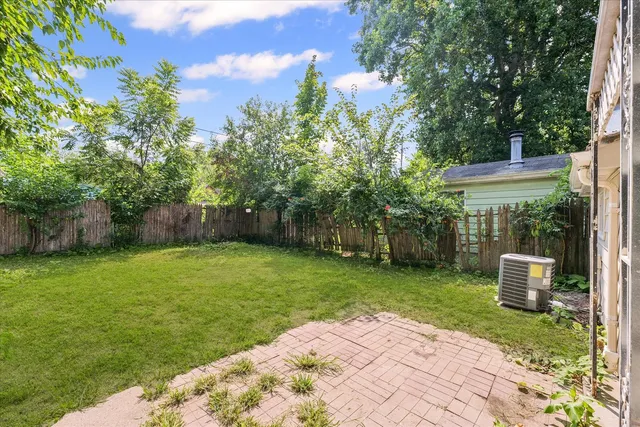 a view of a backyard with a garden