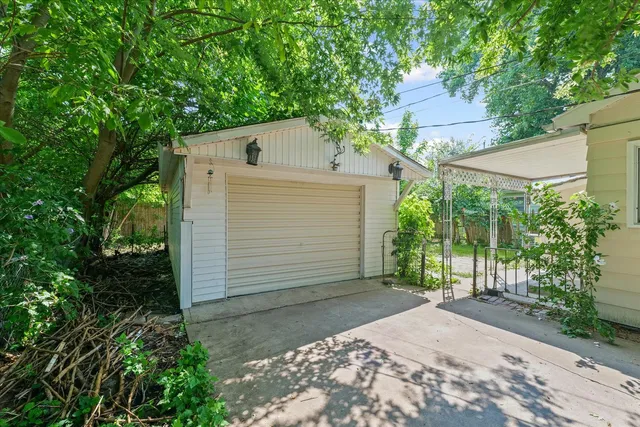 front view of a house with a garden