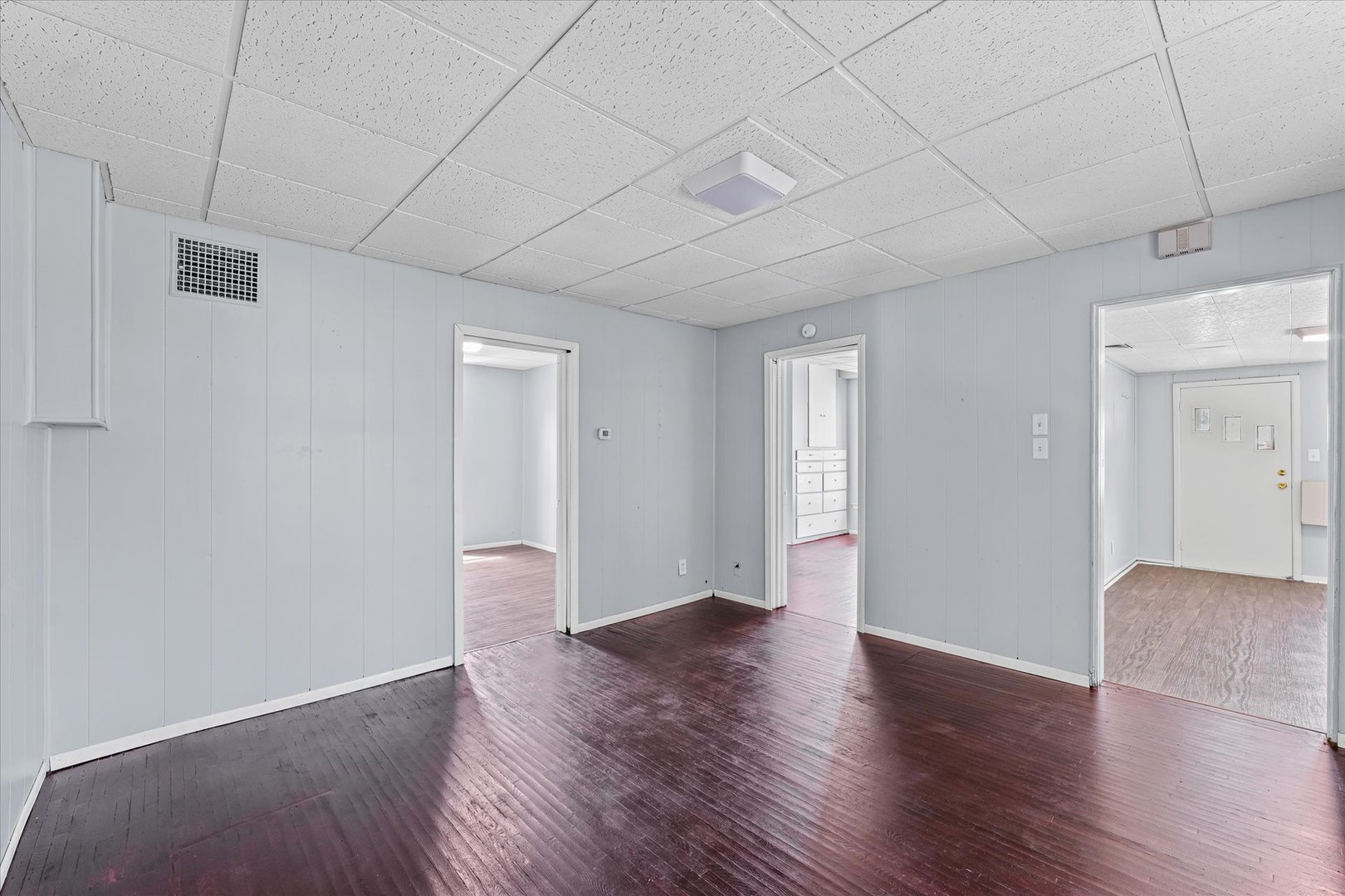 33 State Street Danville, IL 61832 - Photo 8 of 29 a view of an empty room with wooden floor