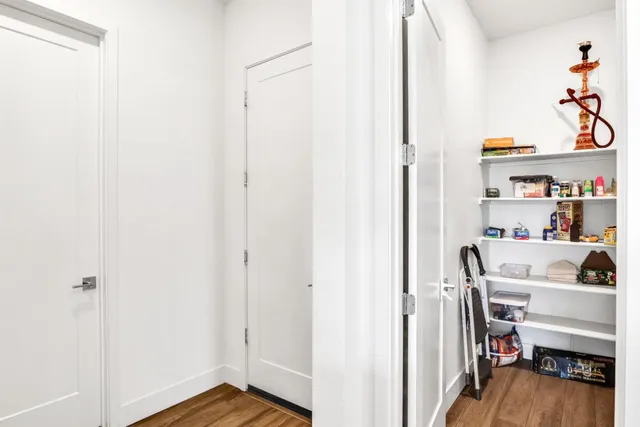 a workspace with furniture and wooden floor
