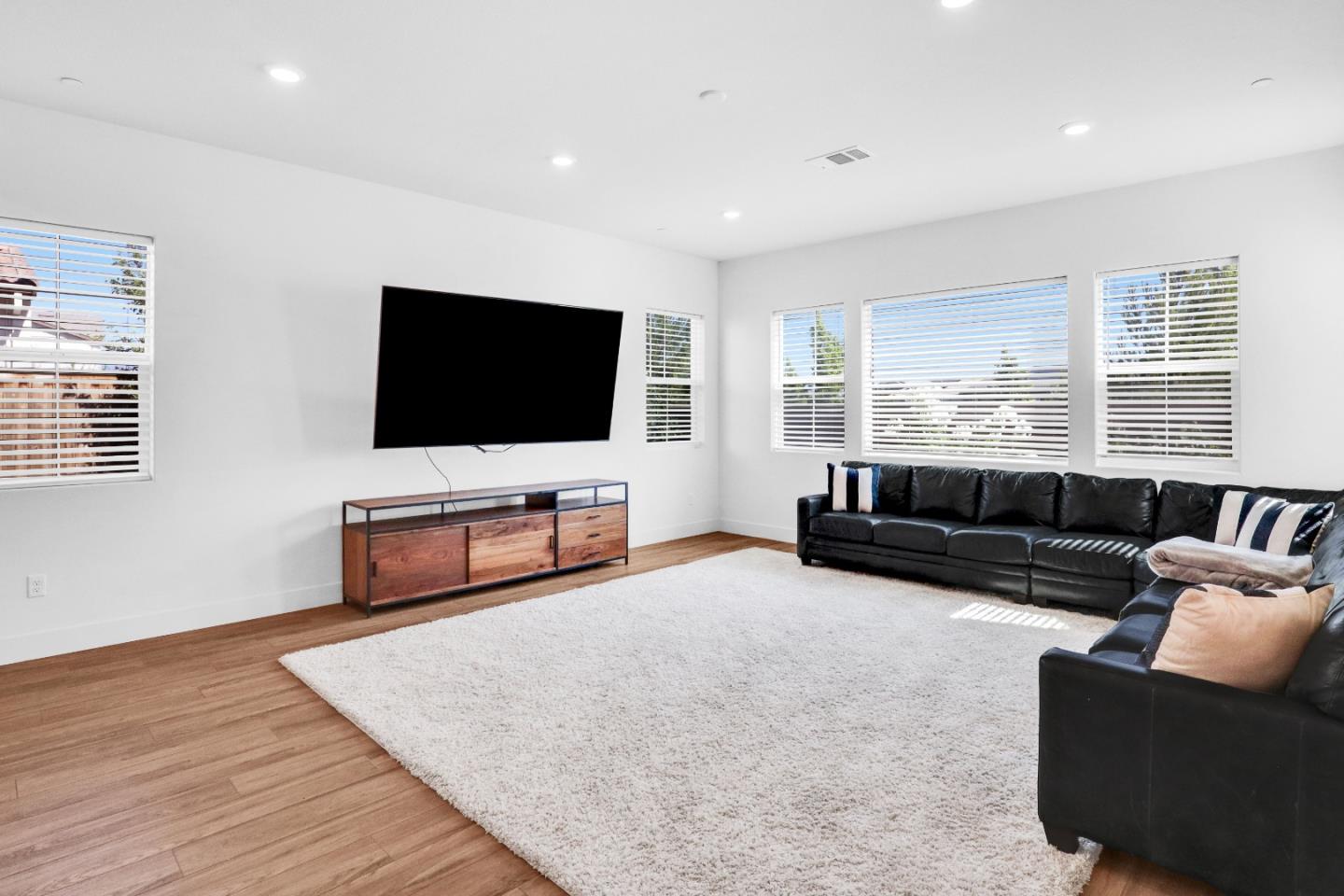 6326 Moser Way Tracy, CA 95377 - Photo 13 of 45 a living room with furniture and a flat screen tv