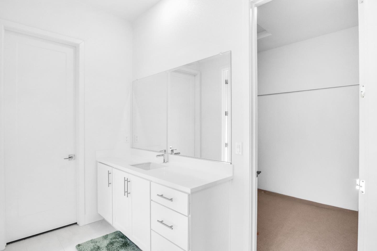 6326 Moser Way Tracy, CA 95377 - Photo 18 of 45 a bathroom with a sink and a mirror