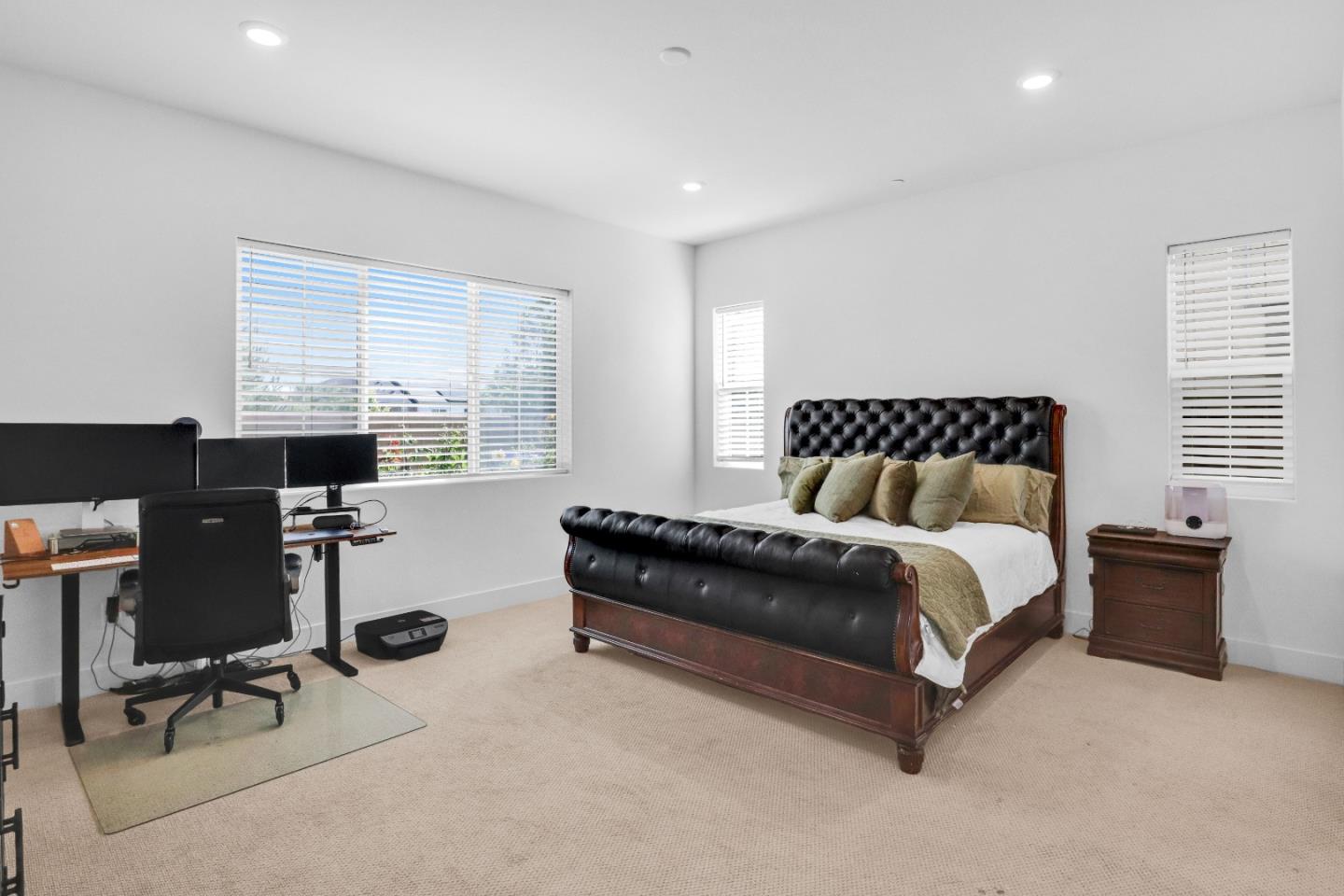 6326 Moser Way Tracy, CA 95377 - Photo 21 of 45 a bedroom with a bed and a desk