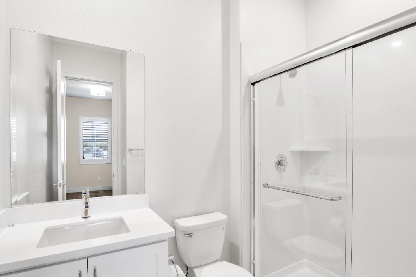 6326 Moser Way Tracy, CA 95377 - Photo 27 of 45 a bathroom with a sink toilet and shower