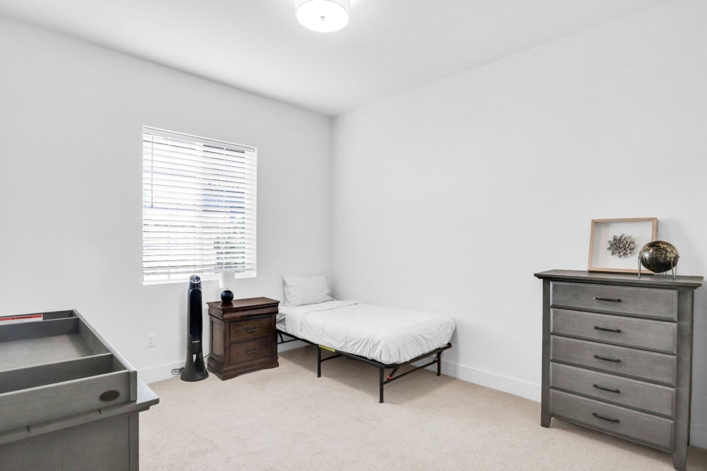 6326 Moser Way Tracy, CA 95377 - Photo 29 of 45 a bedroom with a bed and a window