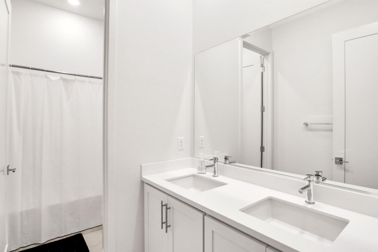 6326 Moser Way Tracy, CA 95377 - Photo 31 of 45 a bathroom with a sink and a mirror