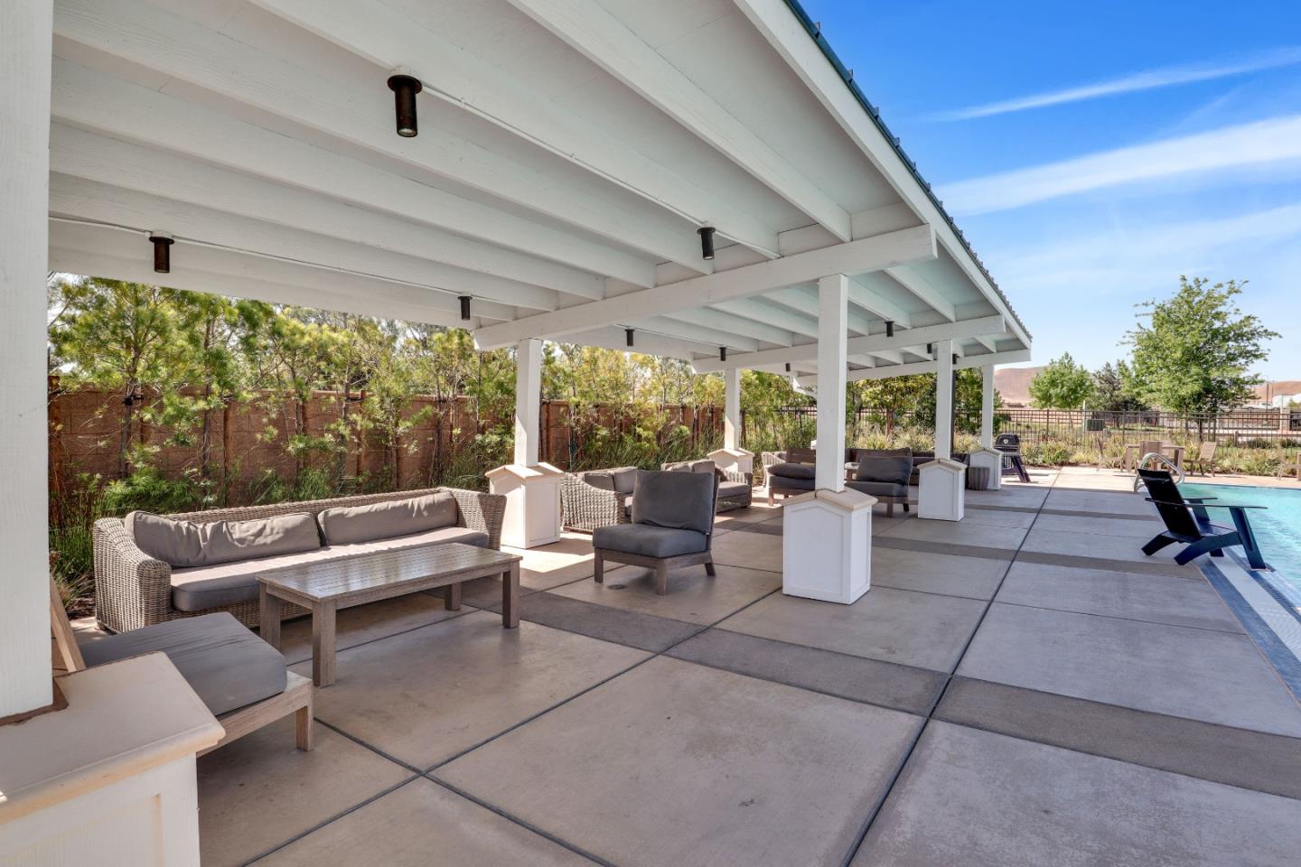 6326 Moser Way Tracy, CA 95377 - Photo 43 of 45 a living room with patio furniture and a potted plants