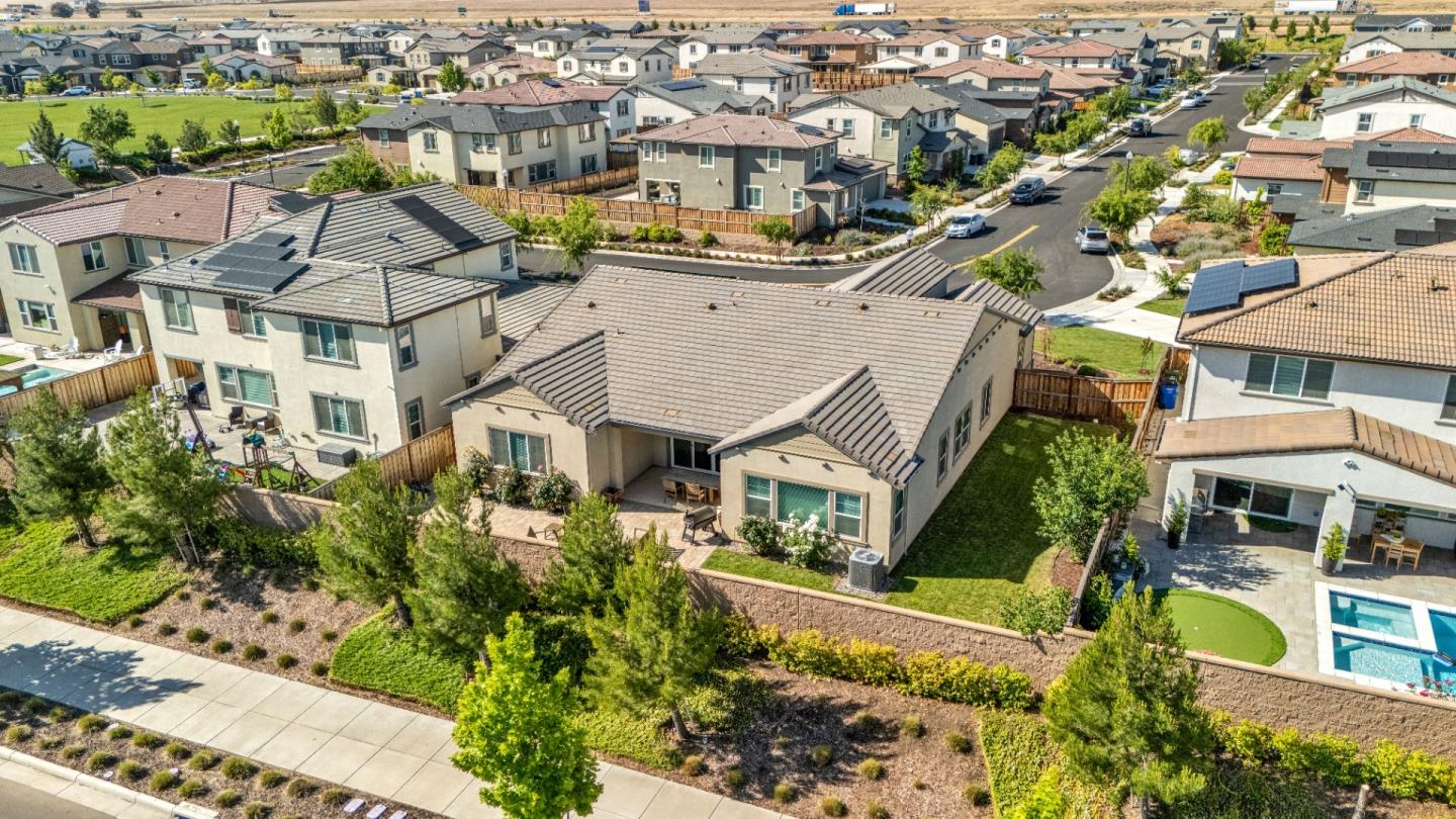 6326 Moser Way Tracy, CA 95377 - Photo 5 of 45 an aerial view of multiple houses with a yard