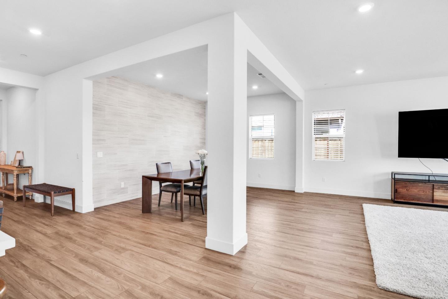 6326 Moser Way Tracy, CA 95377 - Photo 10 of 45 a view of a livingroom with furniture and wooden floor