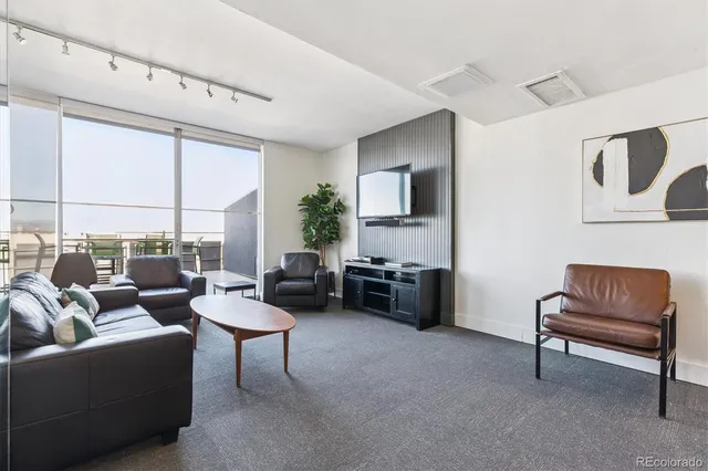 a workspace with furniture and window