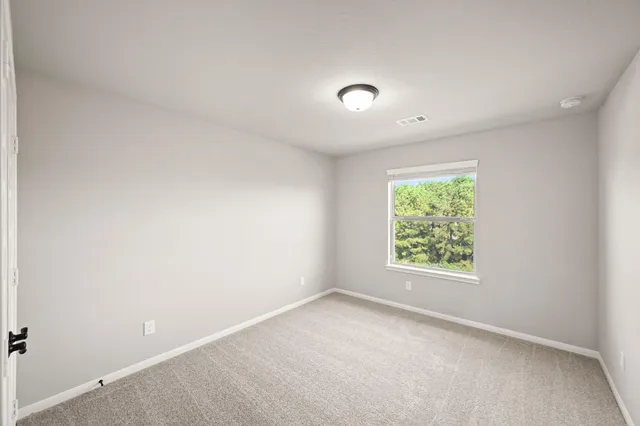 an empty room with a window