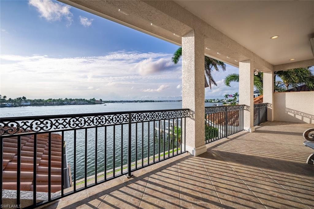 1942 Kingfish Road Naples, FL 34102 - Photo 38 of 43 a view of city from a balcony
