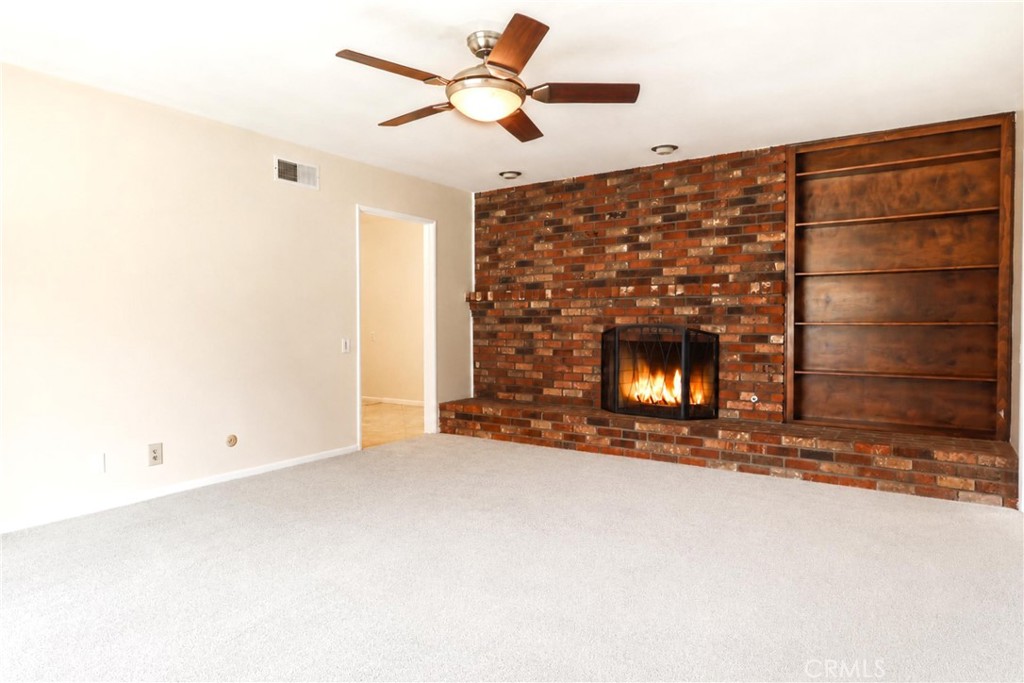 2145 Fairview Avenue Riverside, CA 92506 - Photo 9 of 35 a view of empty room with fireplace