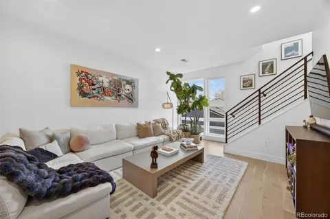 a kitchen with stainless steel appliances kitchen island a refrigerator and a stove