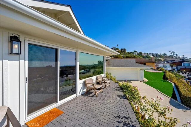 a view of a living room and dining room