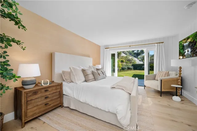 a bed room with a bed and a window