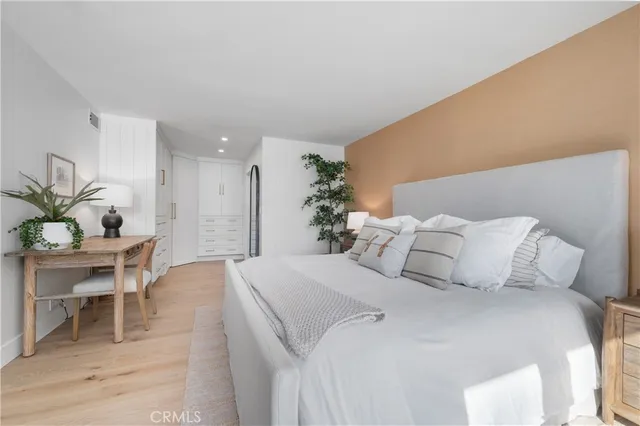 a view of living room with furniture and a potted plant